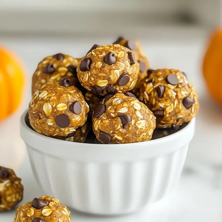 To make Pumpkin Spice Energy Bites, you need the following ingredients: - 1 cup rolled oats - 1/2 cup canned pumpkin puree - 1/4 cup almond butter (or substitute with peanut butter) - 1/4 cup honey or maple syrup - 1 teaspoon pumpkin spice blend - 1/2 teaspoon vanilla extract - 1/4 cup ground flaxseed - 1/4 cup mini chocolate chips (optional, but highly recommended) - Pinch of salt Each ingredient in these bites serves a purpose and boosts health: - Rolled oats: Great for energy and fiber. They keep you full longer. - Pumpkin puree: Packed with vitamins A and C. It adds moisture and flavor. - Almond butter: Provides healthy fats and protein. It helps with heart health. - Honey or maple syrup: Natural sweeteners that give energy and flavor. - Pumpkin spice blend: Adds warmth and comfort. It may help digestion. - Vanilla extract: Enhances flavor. It can also improve mood. - Ground flaxseed: A source of omega-3 fatty acids. It supports heart health. - Mini chocolate chips: They add sweetness. Plus, they make the bites extra fun! - Salt: Balances flavors and enhances sweetness. If you need to swap ingredients, here are some easy options: - Rolled oats: Use quick oats for a different texture. - Almond butter: Peanut butter works well. Sunflower seed butter is a nut-free option. - Honey: Agave syrup can replace honey for a vegan choice. - Pumpkin spice blend: Make your own with cinnamon, nutmeg, and ginger. - Chocolate chips: Try dried fruit or nuts for a healthier twist. These swaps keep the flavor while catering to your needs. Enjoy making these tasty bites! {{ingredient_image_2}} To make pumpkin spice energy bites, start by gathering your ingredients. You need rolled oats, pumpkin puree, almond butter or peanut butter, honey or maple syrup, a pumpkin spice blend, vanilla extract, ground flaxseed, and a pinch of salt. If you like chocolate, have mini chocolate chips ready. This recipe is quick and takes only about 10 minutes to prep. In a large mixing bowl, add the rolled oats, pumpkin puree, almond butter, honey, pumpkin spice blend, vanilla extract, ground flaxseed, and a pinch of salt. Use a spatula or your hands to mix until you form a sticky dough. Make sure everything is well combined; this helps each bite taste amazing. If using, fold in the mini chocolate chips gently. Next, scoop out tablespoon-sized portions of the dough. Roll each portion into compact balls. This makes them easy to eat and helps them keep their shape. Line a baking sheet with parchment paper. Place the rolled energy bites on the sheet, leaving space between each ball. Chill the baking sheet in the refrigerator for at least 30 minutes. This step helps the bites firm up, giving them the right texture. After chilling, transfer the energy bites to an airtight container. This keeps them fresh and ready for snacking. Enjoy your tasty and healthy treats! To make your energy bites just right, focus on the mix. The oats give a chewy base. The pumpkin puree adds moisture. If the mix feels too wet, add a bit more oats or ground flaxseed. This helps them hold their shape. If they feel too dry, a splash of honey or maple syrup can help. You want them sticky but not gooey. Want to boost flavor? Try adding a pinch of nutmeg or cinnamon. These spices work well with pumpkin. You could also mix in some chopped nuts for crunch. If you love chocolate, the mini chocolate chips add a sweet touch. They blend well with the spices. Enjoy experimenting with flavors to find your favorite. You can make these bites ahead of time. Just prepare the mixture and roll them into balls. After that, chill them in the fridge for 30 minutes. Once they are firm, store them in an airtight container. They will stay fresh for up to a week. You can also freeze them for longer storage. Just take out a few when you want a quick, healthy snack! Pro Tips Chill for Better Texture: Allow the energy bites to chill in the refrigerator for at least 30 minutes. This helps them firm up and makes them easier to handle and eat. Mix It Up with Add-Ins: Feel free to customize your energy bites by adding other ingredients like dried fruits, nuts, or seeds for additional flavor and texture. Use Natural Sweeteners: For a healthier option, consider using natural sweeteners like agave nectar or coconut nectar instead of honey or maple syrup. Storage Tips: Store your energy bites in an airtight container in the refrigerator to keep them fresh. They also freeze well for longer storage! {{image_4}} You can switch up the flavors of your energy bites to keep things fun. Try adding dried fruit like cranberries or raisins for a sweet twist. Chopped nuts, like walnuts or pecans, add crunch and healthy fats. Want a chocolatey kick? Use cocoa powder instead of pumpkin spice. You can also swap in a different spice mix, like cinnamon or ginger, for a unique taste. These energy bites are easy to make for different diets. To make them vegan, simply replace honey with maple syrup. For a gluten-free option, confirm that your oats are certified gluten-free. Most other ingredients are naturally gluten-free, so you can enjoy these bites worry-free. If you're nut-free, use sunflower seed butter instead of almond or peanut butter. Pumpkin spice energy bites are great for any time of day. Enjoy them as a quick snack between meals. They also work well as a grab-and-go breakfast. Just pair them with yogurt or fruit for a balanced start. Feeling sweet? Serve them as a dessert. They’re perfect for gatherings, too. Display them in a mason jar or on a plate to impress your guests! To keep your pumpkin spice energy bites fresh, store them in an airtight container. This helps prevent air from drying them out. You can also layer parchment paper between bites. This will stop them from sticking together. Always keep the container in a cool, dry place or in the fridge. Stored in the fridge, these energy bites can last about one week. The cold helps maintain their flavor and texture. If you notice any changes in smell or look, it’s best to toss them. Always check before snacking! You can freeze these energy bites for longer storage. Place them in a single layer on a baking sheet. Freeze for about one hour until they harden. Then, transfer them to a freezer-safe bag or container. They can last up to three months in the freezer. When ready to eat, let them thaw in the fridge overnight. Enjoy your tasty snack whenever you like! Pumpkin spice energy bites are small, no-bake snacks made with wholesome ingredients. They combine rolled oats, pumpkin puree, almond butter, honey, and pumpkin spice. These bites are chewy, tasty, and packed with nutrients. They provide energy and comfort, perfect for any time of the day. You can make these bites healthier by using natural sweeteners. Instead of honey, try mashed banana or unsweetened applesauce. You can also reduce the chocolate chips or omit them altogether. Adding more flaxseed boosts fiber and omega-3 fatty acids, making them even better for you. Yes! If you want to avoid nuts, simply replace almond butter with sunflower seed butter or tahini. Both options work well and still give a creamy texture. Just make sure to check for allergies if you're sharing these bites with others. Absolutely! Pumpkin spice energy bites are a great snack for kids. They are fun to eat and provide energy for play. They also have a sweet taste that kids love. Just be mindful of any nut allergies when serving them. You can enjoy these bites straight from the fridge as a quick snack. They also make a great addition to lunchboxes. For a treat, pair them with a warm drink, like apple cider or hot chocolate. They’re versatile and perfect for any occasion! This article covered everything you need to know about pumpkin spice energy bites. We explored the key ingredients, their benefits, and tasty alternatives. I shared easy step-by-step instructions to prepare these bites, plus tips for the perfect texture and flavor. We also discussed variations for dietary needs and how to store them properly. Now you can enjoy these delicious snacks anytime. Get creative with flavors or share them with friends. Whether for breakfast or a treat, these bites are sure to please. Enjoy making them!