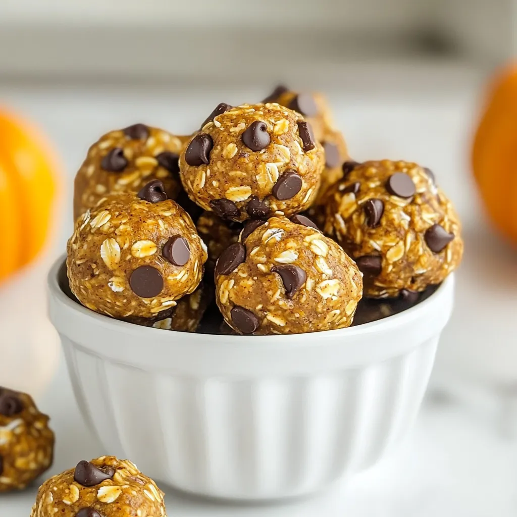 To make Pumpkin Spice Energy Bites, you need the following ingredients: - 1 cup rolled oats - 1/2 cup canned pumpkin puree - 1/4 cup almond butter (or substitute with peanut butter) - 1/4 cup honey or maple syrup - 1 teaspoon pumpkin spice blend - 1/2 teaspoon vanilla extract - 1/4 cup ground flaxseed - 1/4 cup mini chocolate chips (optional, but highly recommended) - Pinch of salt Each ingredient in these bites serves a purpose and boosts health: - Rolled oats: Great for energy and fiber. They keep you full longer. - Pumpkin puree: Packed with vitamins A and C. It adds moisture and flavor. - Almond butter: Provides healthy fats and protein. It helps with heart health. - Honey or maple syrup: Natural sweeteners that give energy and flavor. - Pumpkin spice blend: Adds warmth and comfort. It may help digestion. - Vanilla extract: Enhances flavor. It can also improve mood. - Ground flaxseed: A source of omega-3 fatty acids. It supports heart health. - Mini chocolate chips: They add sweetness. Plus, they make the bites extra fun! - Salt: Balances flavors and enhances sweetness. If you need to swap ingredients, here are some easy options: - Rolled oats: Use quick oats for a different texture. - Almond butter: Peanut butter works well. Sunflower seed butter is a nut-free option. - Honey: Agave syrup can replace honey for a vegan choice. - Pumpkin spice blend: Make your own with cinnamon, nutmeg, and ginger. - Chocolate chips: Try dried fruit or nuts for a healthier twist. These swaps keep the flavor while catering to your needs. Enjoy making these tasty bites! {{ingredient_image_2}} To make pumpkin spice energy bites, start by gathering your ingredients. You need rolled oats, pumpkin puree, almond butter or peanut butter, honey or maple syrup, a pumpkin spice blend, vanilla extract, ground flaxseed, and a pinch of salt. If you like chocolate, have mini chocolate chips ready. This recipe is quick and takes only about 10 minutes to prep. In a large mixing bowl, add the rolled oats, pumpkin puree, almond butter, honey, pumpkin spice blend, vanilla extract, ground flaxseed, and a pinch of salt. Use a spatula or your hands to mix until you form a sticky dough. Make sure everything is well combined; this helps each bite taste amazing. If using, fold in the mini chocolate chips gently. Next, scoop out tablespoon-sized portions of the dough. Roll each portion into compact balls. This makes them easy to eat and helps them keep their shape. Line a baking sheet with parchment paper. Place the rolled energy bites on the sheet, leaving space between each ball. Chill the baking sheet in the refrigerator for at least 30 minutes. This step helps the bites firm up, giving them the right texture. After chilling, transfer the energy bites to an airtight container. This keeps them fresh and ready for snacking. Enjoy your tasty and healthy treats! To make your energy bites just right, focus on the mix. The oats give a chewy base. The pumpkin puree adds moisture. If the mix feels too wet, add a bit more oats or ground flaxseed. This helps them hold their shape. If they feel too dry, a splash of honey or maple syrup can help. You want them sticky but not gooey. Want to boost flavor? Try adding a pinch of nutmeg or cinnamon. These spices work well with pumpkin. You could also mix in some chopped nuts for crunch. If you love chocolate, the mini chocolate chips add a sweet touch. They blend well with the spices. Enjoy experimenting with flavors to find your favorite. You can make these bites ahead of time. Just prepare the mixture and roll them into balls. After that, chill them in the fridge for 30 minutes. Once they are firm, store them in an airtight container. They will stay fresh for up to a week. You can also freeze them for longer storage. Just take out a few when you want a quick, healthy snack! Pro Tips Chill for Better Texture: Allow the energy bites to chill in the refrigerator for at least 30 minutes. This helps them firm up and makes them easier to handle and eat. Mix It Up with Add-Ins: Feel free to customize your energy bites by adding other ingredients like dried fruits, nuts, or seeds for additional flavor and texture. Use Natural Sweeteners: For a healthier option, consider using natural sweeteners like agave nectar or coconut nectar instead of honey or maple syrup. Storage Tips: Store your energy bites in an airtight container in the refrigerator to keep them fresh. They also freeze well for longer storage! {{image_4}} You can switch up the flavors of your energy bites to keep things fun. Try adding dried fruit like cranberries or raisins for a sweet twist. Chopped nuts, like walnuts or pecans, add crunch and healthy fats. Want a chocolatey kick? Use cocoa powder instead of pumpkin spice. You can also swap in a different spice mix, like cinnamon or ginger, for a unique taste. These energy bites are easy to make for different diets. To make them vegan, simply replace honey with maple syrup. For a gluten-free option, confirm that your oats are certified gluten-free. Most other ingredients are naturally gluten-free, so you can enjoy these bites worry-free. If you're nut-free, use sunflower seed butter instead of almond or peanut butter. Pumpkin spice energy bites are great for any time of day. Enjoy them as a quick snack between meals. They also work well as a grab-and-go breakfast. Just pair them with yogurt or fruit for a balanced start. Feeling sweet? Serve them as a dessert. They’re perfect for gatherings, too. Display them in a mason jar or on a plate to impress your guests! To keep your pumpkin spice energy bites fresh, store them in an airtight container. This helps prevent air from drying them out. You can also layer parchment paper between bites. This will stop them from sticking together. Always keep the container in a cool, dry place or in the fridge. Stored in the fridge, these energy bites can last about one week. The cold helps maintain their flavor and texture. If you notice any changes in smell or look, it’s best to toss them. Always check before snacking! You can freeze these energy bites for longer storage. Place them in a single layer on a baking sheet. Freeze for about one hour until they harden. Then, transfer them to a freezer-safe bag or container. They can last up to three months in the freezer. When ready to eat, let them thaw in the fridge overnight. Enjoy your tasty snack whenever you like! Pumpkin spice energy bites are small, no-bake snacks made with wholesome ingredients. They combine rolled oats, pumpkin puree, almond butter, honey, and pumpkin spice. These bites are chewy, tasty, and packed with nutrients. They provide energy and comfort, perfect for any time of the day. You can make these bites healthier by using natural sweeteners. Instead of honey, try mashed banana or unsweetened applesauce. You can also reduce the chocolate chips or omit them altogether. Adding more flaxseed boosts fiber and omega-3 fatty acids, making them even better for you. Yes! If you want to avoid nuts, simply replace almond butter with sunflower seed butter or tahini. Both options work well and still give a creamy texture. Just make sure to check for allergies if you're sharing these bites with others. Absolutely! Pumpkin spice energy bites are a great snack for kids. They are fun to eat and provide energy for play. They also have a sweet taste that kids love. Just be mindful of any nut allergies when serving them. You can enjoy these bites straight from the fridge as a quick snack. They also make a great addition to lunchboxes. For a treat, pair them with a warm drink, like apple cider or hot chocolate. They’re versatile and perfect for any occasion! This article covered everything you need to know about pumpkin spice energy bites. We explored the key ingredients, their benefits, and tasty alternatives. I shared easy step-by-step instructions to prepare these bites, plus tips for the perfect texture and flavor. We also discussed variations for dietary needs and how to store them properly. Now you can enjoy these delicious snacks anytime. Get creative with flavors or share them with friends. Whether for breakfast or a treat, these bites are sure to please. Enjoy making them!
